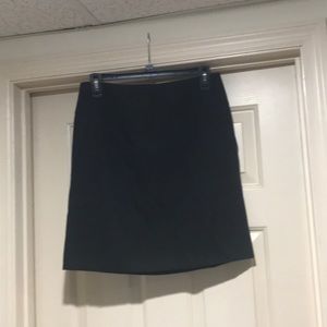 Black suit skirt.